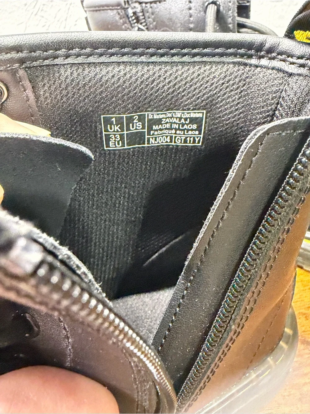 Dr. Martens Black Leather Boots with Yellow Accent